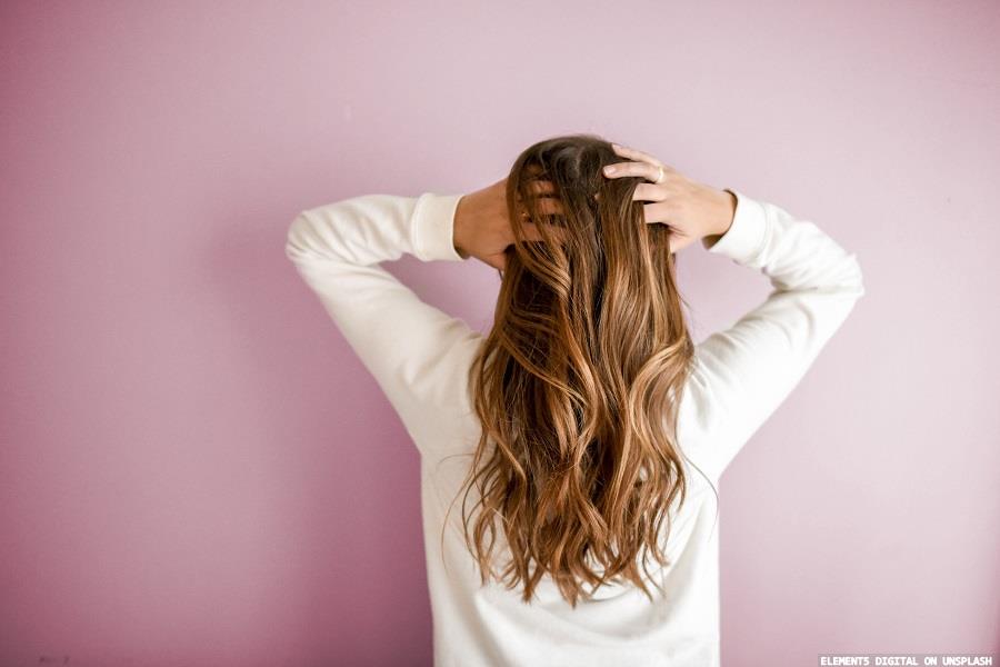 Natural elastomer for hair care